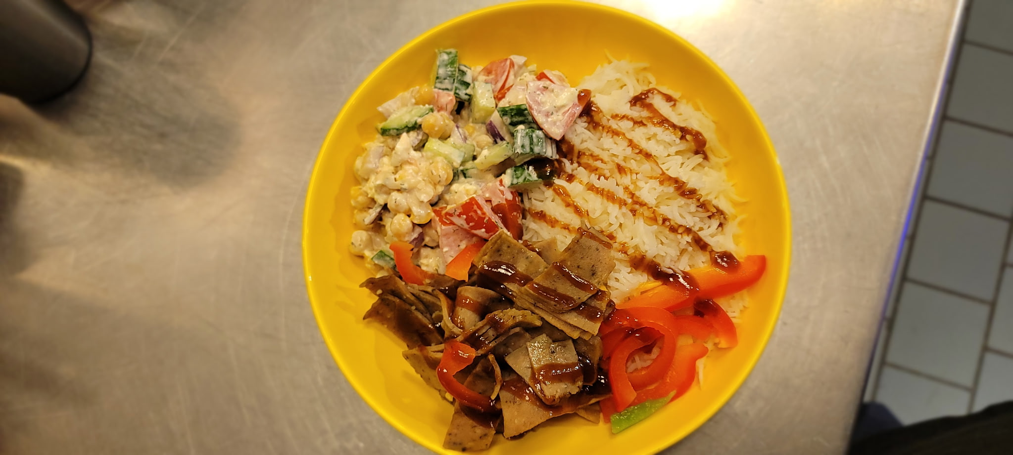 A platter of Persian dishes served at Mazeh Persian Cafe